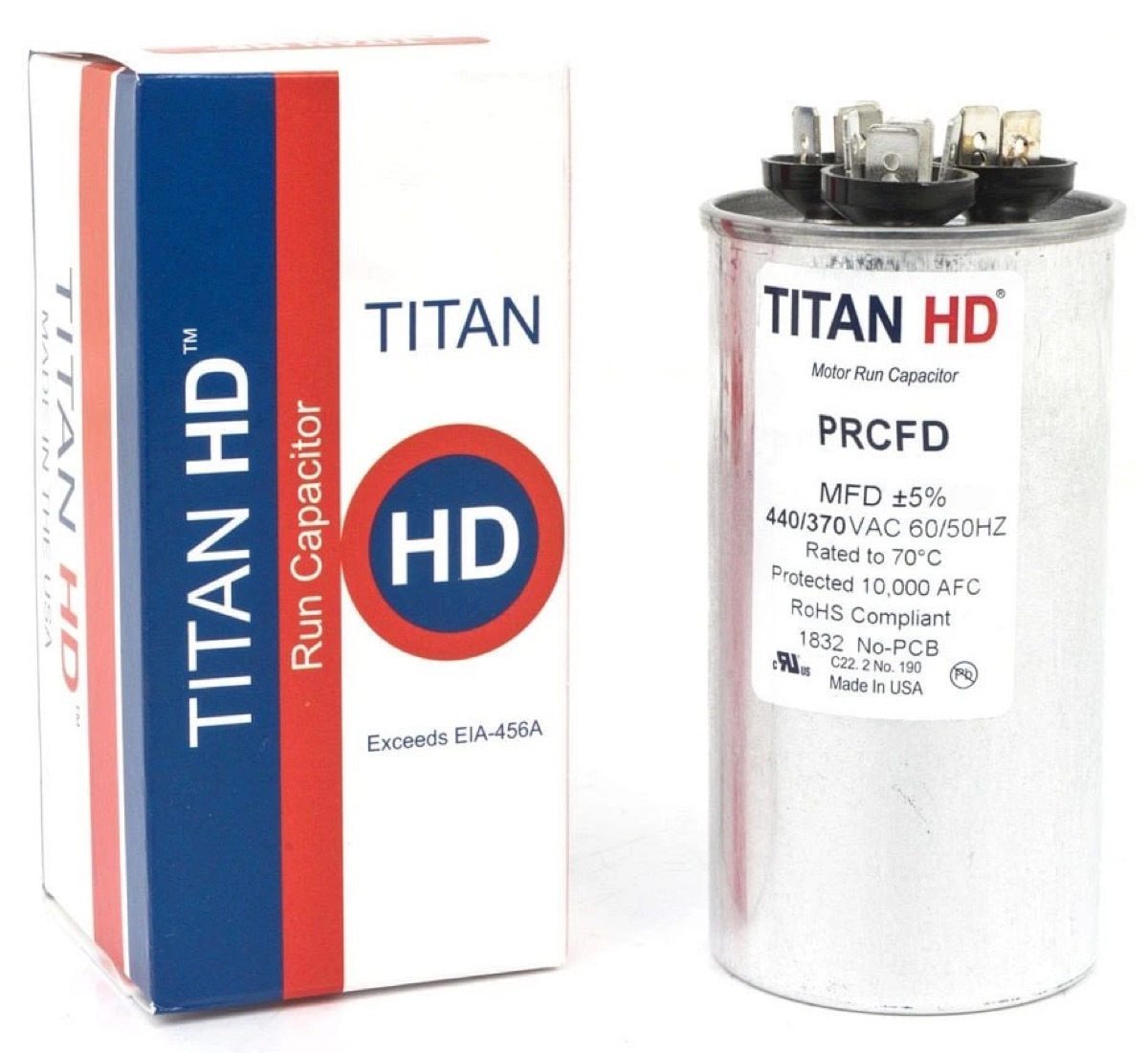 A round dual run capacitor beside its box, with three terminal groups marked C, FAN and HERM, rated 440/370VAC